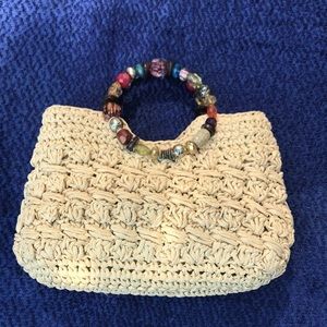 Boho straw bag with a beautiful jewel handle